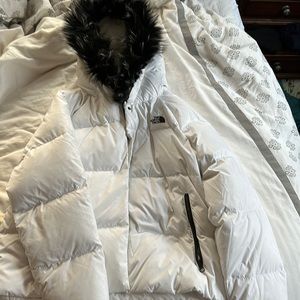 White North Face puffer coat